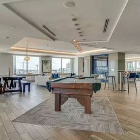 resident clubroom with pool table and ample seating