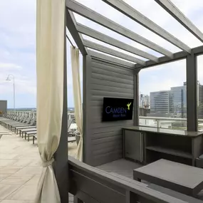 Rooftop private cabana with tv and refrigerator at Camden Music Row apartments in Nashville, TN