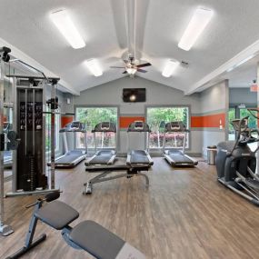 Health and Fitness Club including Cardio Machines and Weight Training Equipment. Flat Screen TVs and more at Rosemont Apartments