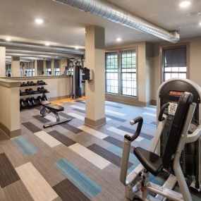 Fitness Center with Cardio, CrossFit & Yoga Components at Echo at North Pointe Center Apartment Homes