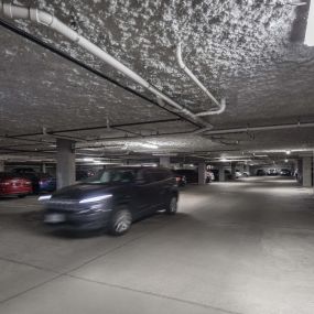 Underground parking garage under the Flats side of Camden Greenville apartments in Dallas, TX