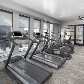 24-hour fitness center with cardio machines at Camden Greenville apartments in Dallas, TX