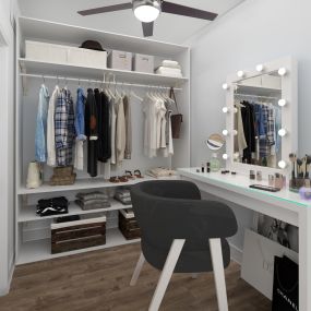 Flex space used as a glam room with a vanity and large wardrobe at Camden Greenville