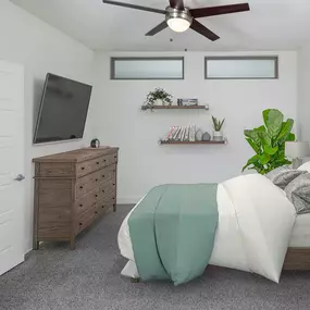 Flats bedroom with windows to the living room