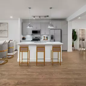 Villas townhome kitchen with gray cabinets and an island at Camden Greenville