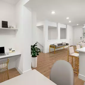 Villas townhome dining room with built-in desk and view toward the private garage stairs at Camden Greenville