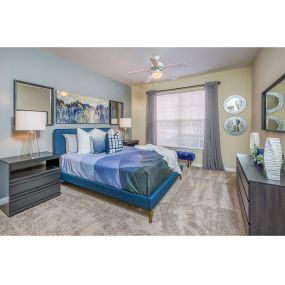 Bedroom With Expansive Window at One Rocky Ridge