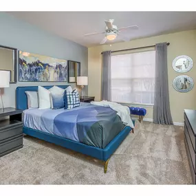 Bedroom With Expansive Window at One Rocky Ridge