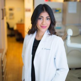 Midtown Dental Care Dr. Randhawa standing headshot