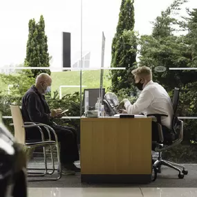 Customer inside the Land Rover Stockton dealership