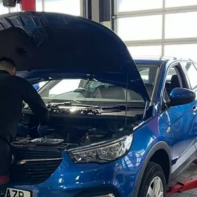 Car inside the Vauxhall Service centre Wigan workshop