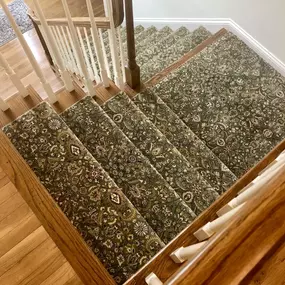 Stair Runners:

Give your stairs a luxury and tailored look! Carpet One has many options for our customers to choose from.  Carpet One is the only flooring store in the Bluegrass that delivers custom stair runners including binding with cotton or leather, surging and boarders.