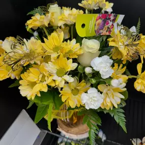 The staff at Flowerama Des Moines are so happy to be working on Yellow flower Day. ????????????