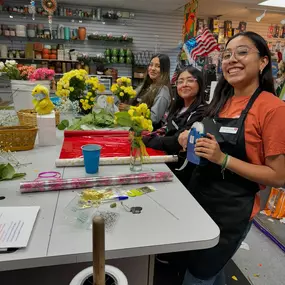 The staff at Flowerama Des Moines are so happy to be working on Yellow flower Day. ????????????