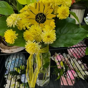 The staff at Flowerama Des Moines are so happy to be working on Yellow flower Day. ????????????