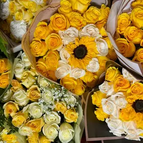 The staff at Flowerama Des Moines are so happy to be working on Yellow flower Day. ????????????