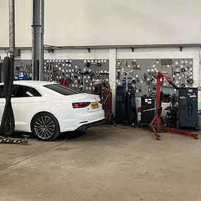 Cars inside the Vauxhall Service Centre Middlesbrough workshop