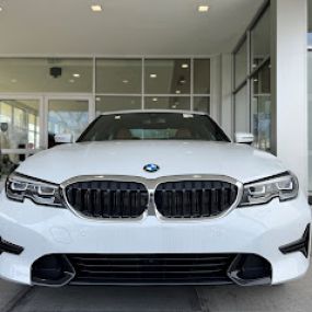 white BMW SUV front view