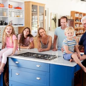 Family gathered in an updated kitchen in Fort Wayne