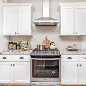 white refinished cabinets