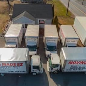 Business exterior with moving vans
