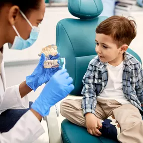 Pedaitric dentist with young boy