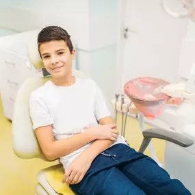 young boy at pediatric dentist