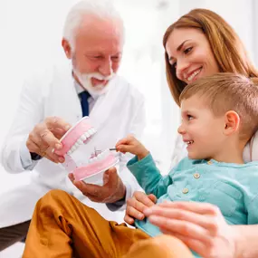 Pediatric dentist with a patient