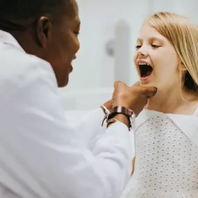 Dr. Schweppe's Pediatric Dentistry with a young girl