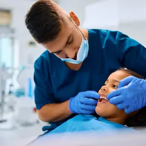 Pediatric Dentist in Ogden working with a patient