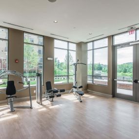 Two-story fitness center with strength training equipment