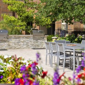 Poolside grills at Camden Franklin Park apartments in Franklin, TN