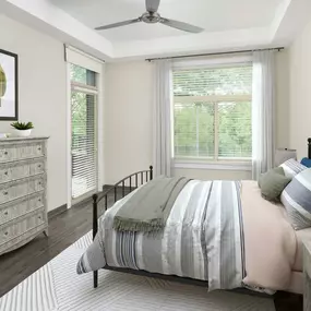 Bedroom with wood-style flooring and patio access at Camden Franklin Park