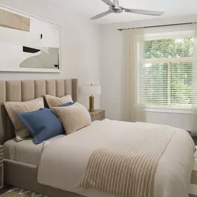 Bedroom with wood-style flooring and ceiling fan at Camden Franklin Park