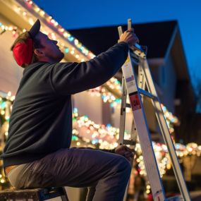 We remove and store Christmas Lights.