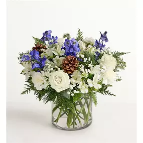Winter Wishes Bouquet Inspired by winter’s cool blue and white landscape, our arrangement delivers warm wishes to those you love