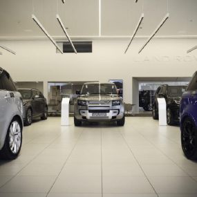 Cars inside the Land Rover Cardiff showroom