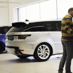 Cars inside the Land Rover Cardiff showroom