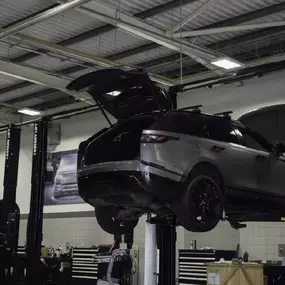 Grey Range Rover Velar on Stratstone Land Rover Newport Service Ramp