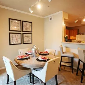 Gorgeous Dining Room Space with Elegant Crown Moulding at Legacy Farm Apartments