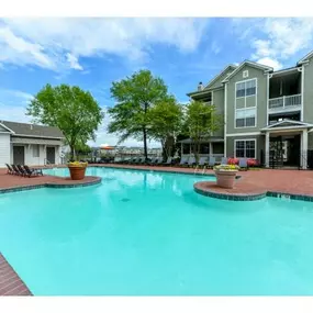 Refreshing Swimming Pool with Sun Deck and Lounges at Legacy Farm Apartments