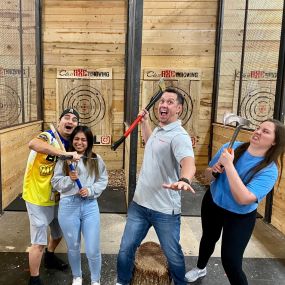 Celebrating our team success with axe-throwing
