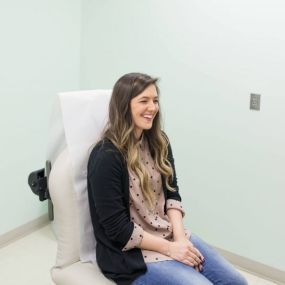 Patient in Exam Room at Skin Wellness Dermatology Center