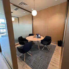 Office space at Jeff Wyler Kia of Colerain in Colerain, OH, where sales consultants meet with customers to discuss new Kia models, pre-owned vehicles, financing options, and a personalized car-buying experience near Cincinnati.