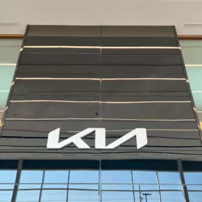 Interior signage at Jeff Wyler Kia of Colerain, welcoming customers to the dealership and highlighting a trusted Kia location serving Colerain and the greater Cincinnati area with new and pre-owned vehicles.
