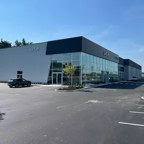 Side view of Jeff Wyler Kia of Colerain, a full-service Kia dealership offering new Kia models, used vehicles, and customer support for drivers across Greater Cincinnati.