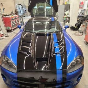 Top Line Auto Body works to buff out any dents in your car in order to make it look fresh and new!