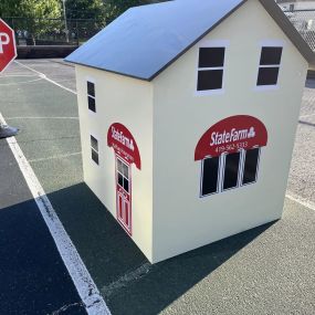 Not only do we help people manage risks daily, but did you know that your local State Farm team is pretty crafty too?! Nathan built this little building for the Bucyrus Safety Town program, our very own Heather did an awesome paint job, and Stacy made some beautiful decals to make it look just like our office!