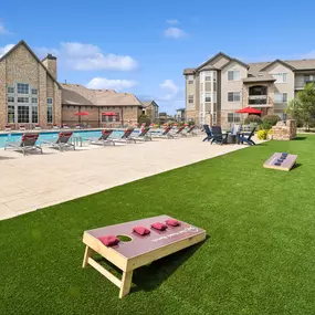 Poolside Lawn with Cornhole