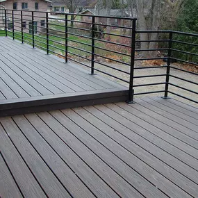 Add modern elegance and enhanced safety to your outdoor space with Cedar Works' metal railing installation in Commerce Charter Twp, MI. Our sleek aluminum and steel railings perfectly complement upscale decks, offering low-maintenance durability and unobstructed views with a contemporary finish.